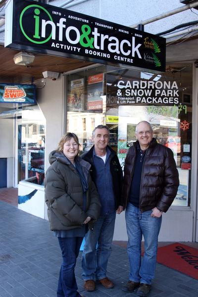 Amanda and David Gatward-Ferguson flank previous owner Chris Smith outside their new business